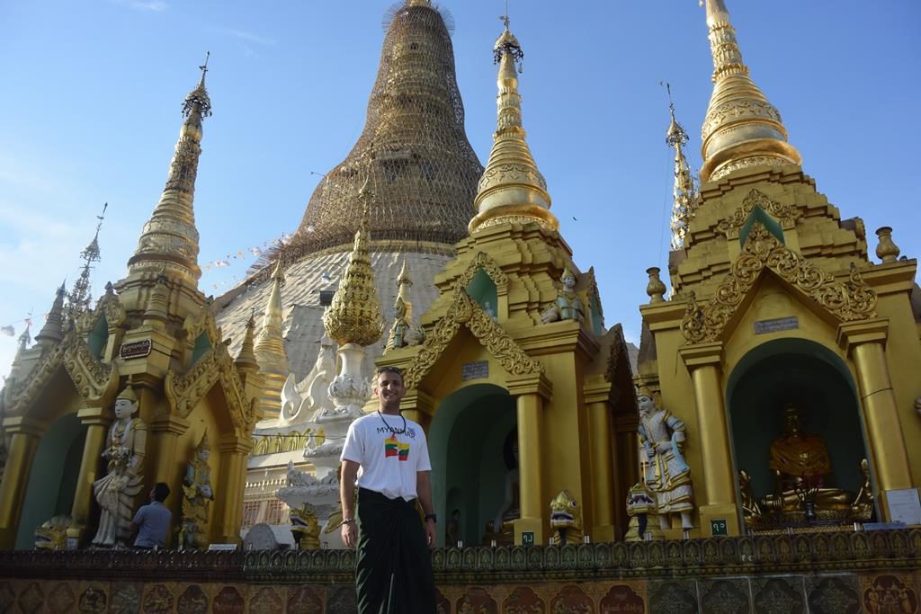 The contrast of the golden pagodas to modern day Myanmar 