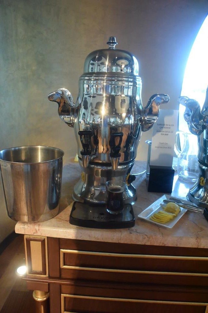 a silver coffee machine on a counter