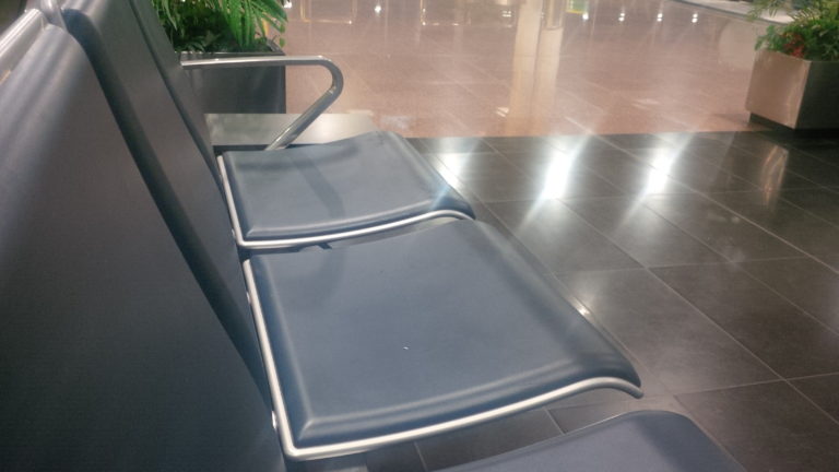 Airports With Armrests: A Case of Cruelty