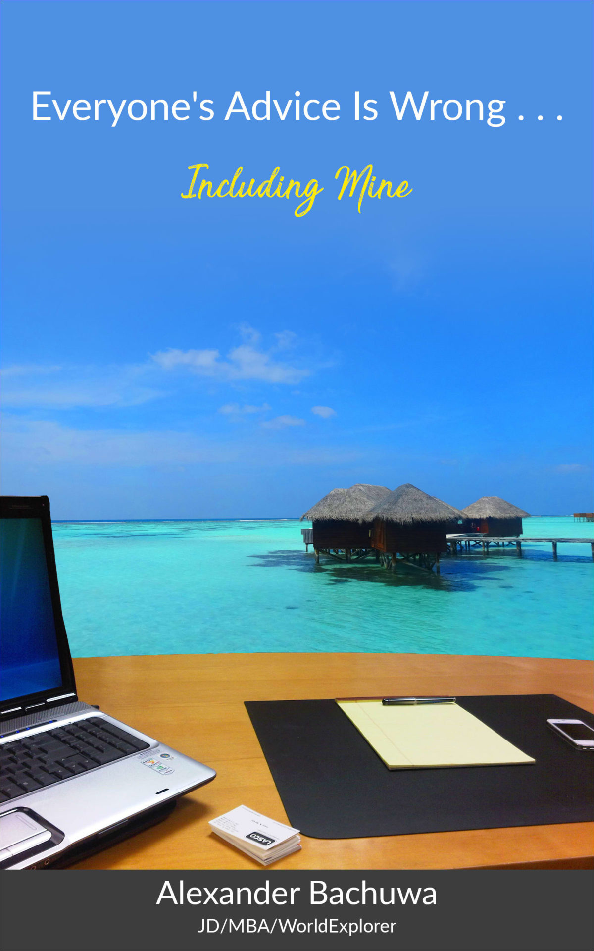 a laptop on a desk in front of a water bungalow