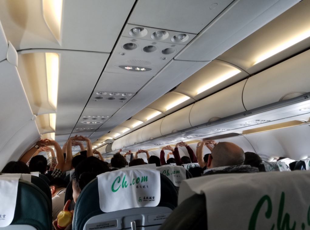 Tai Chi en deportation flight to Hong Kong 