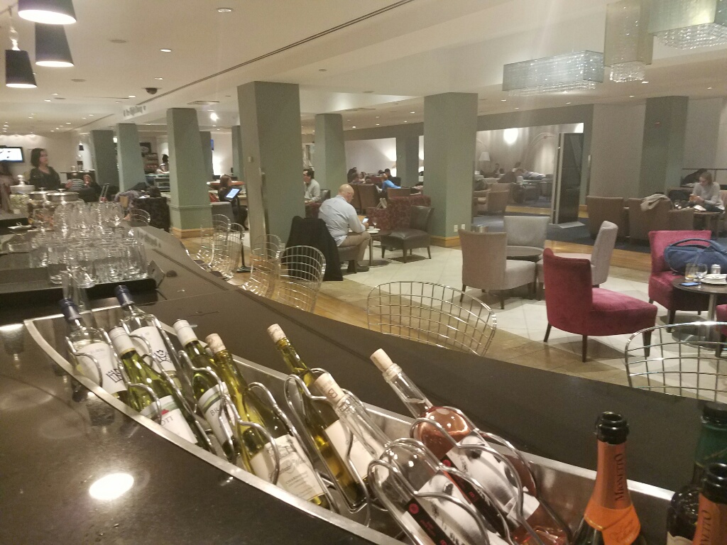 a bar with bottles of wine