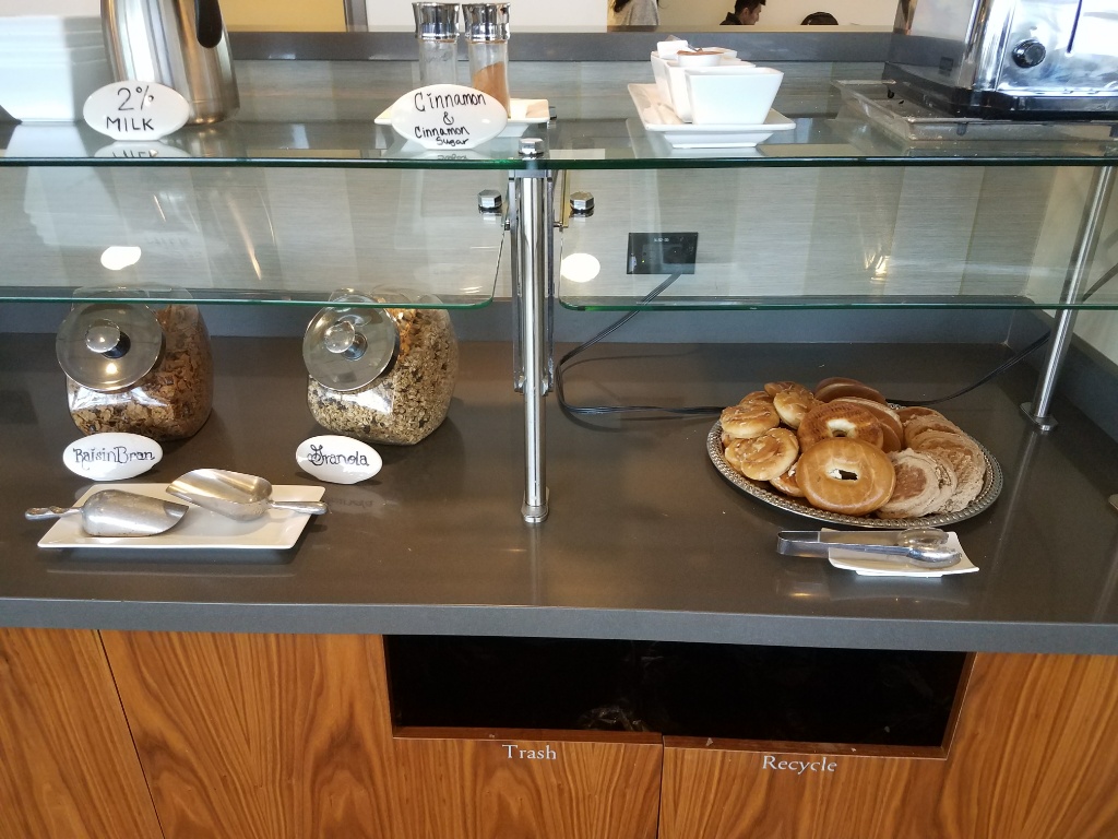 a counter with a variety of food items on it