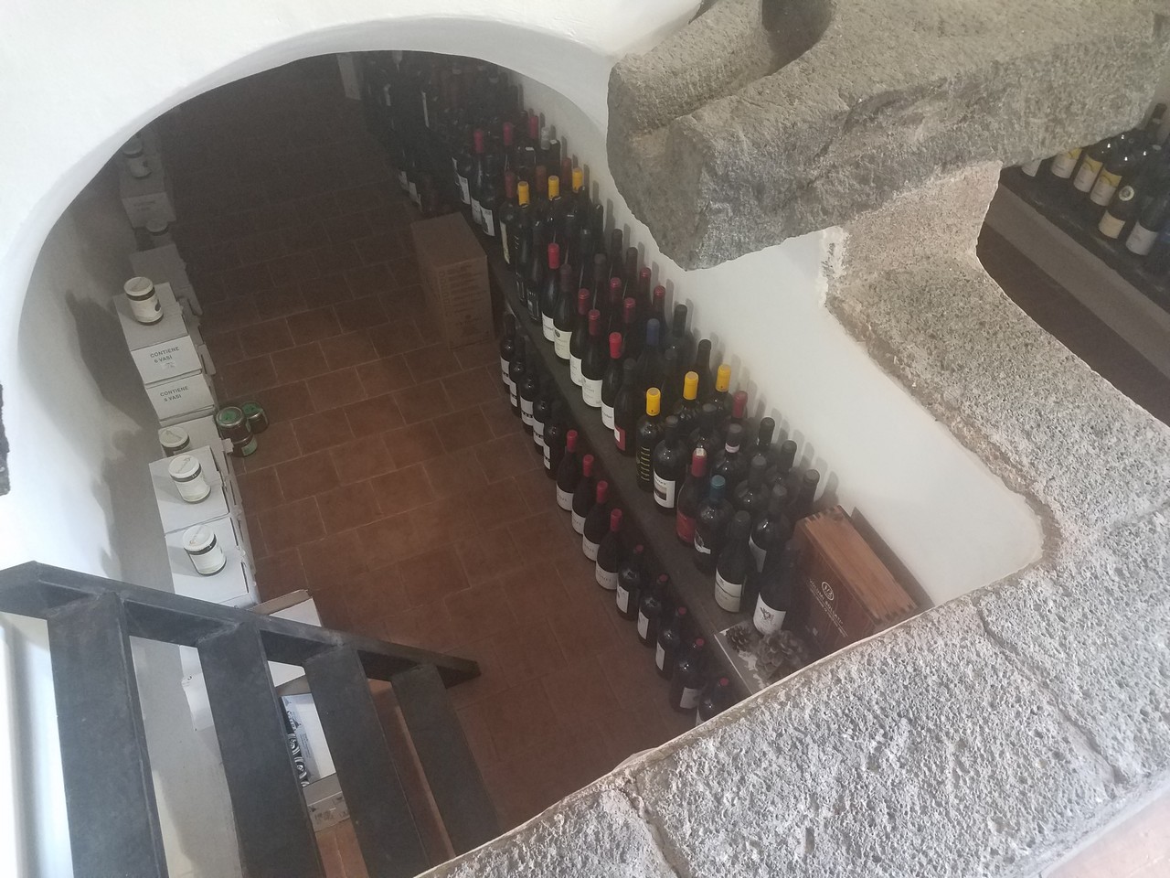a wine cellar with many bottles