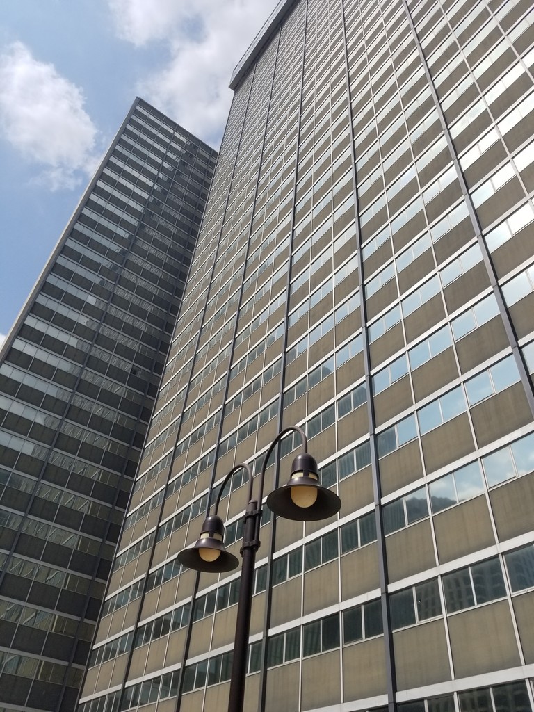 a tall building with a lamp post