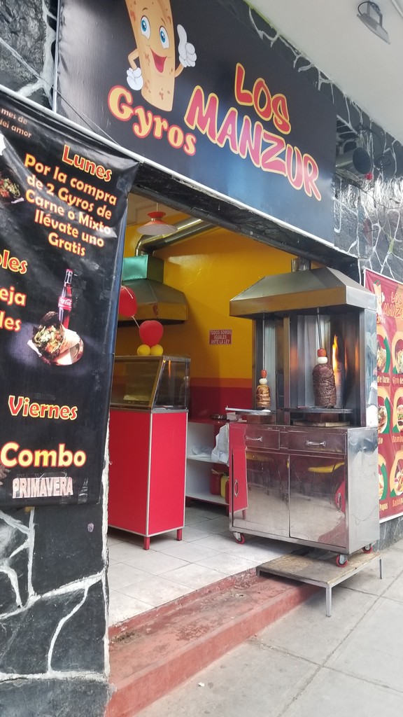 a food stand outside of a restaurant