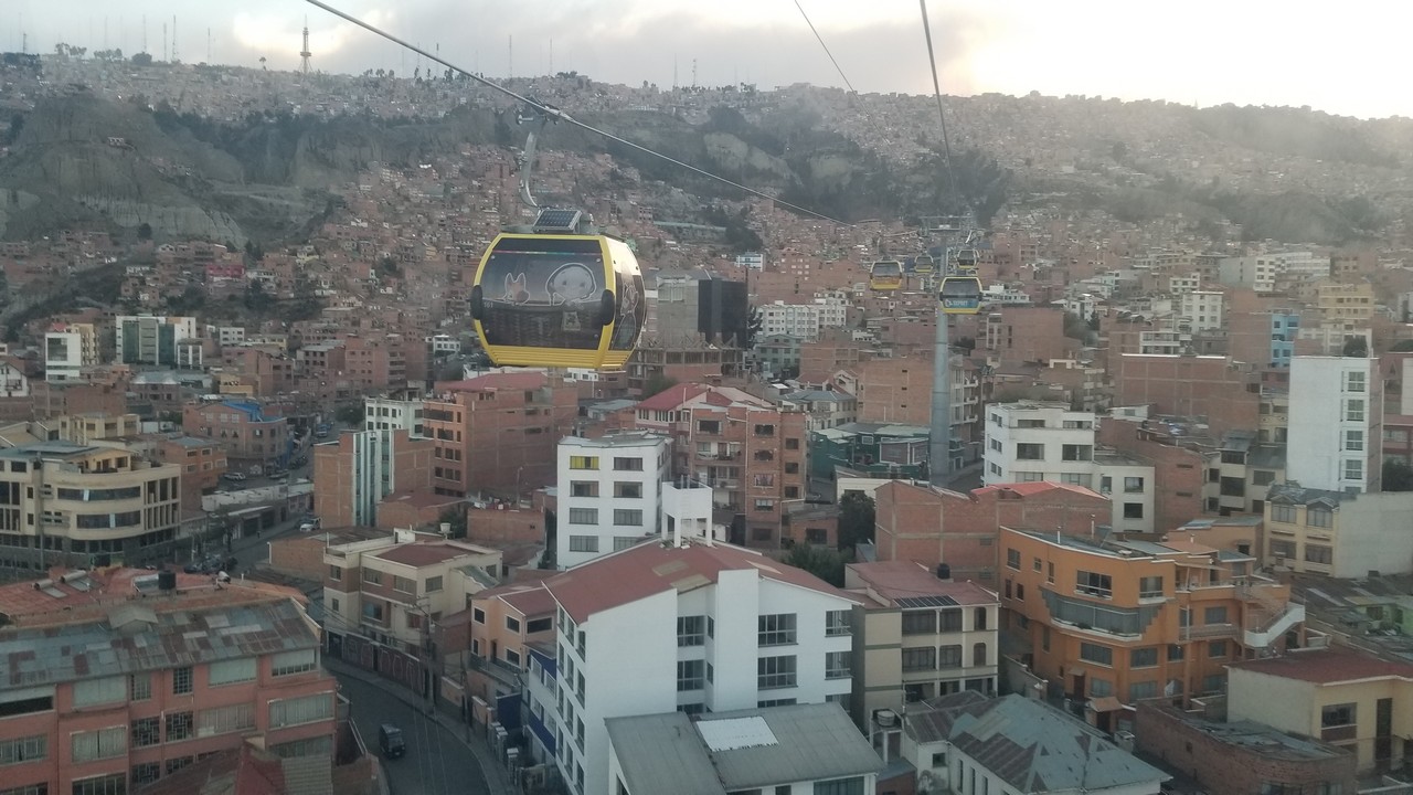 a cable car over a city