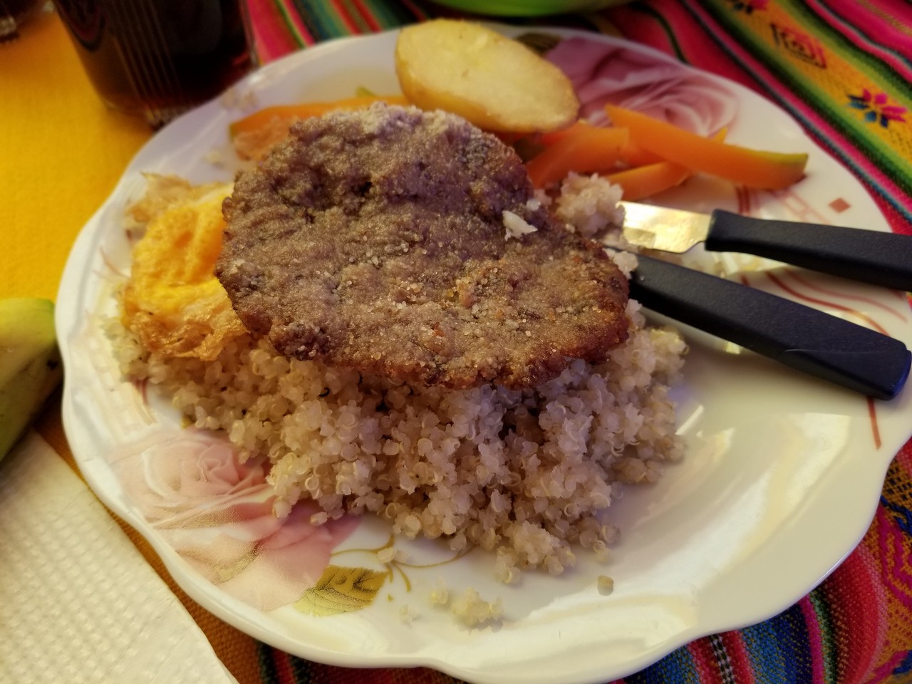 a plate of food with a fork and knife