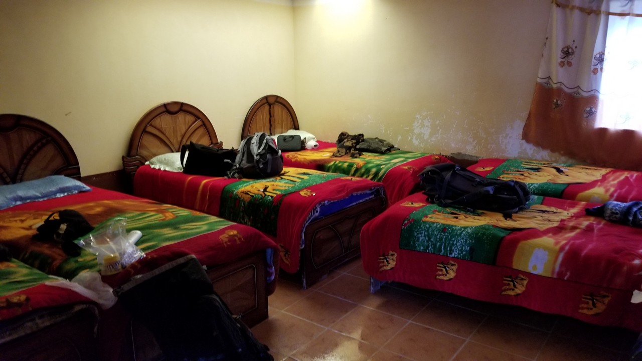 a room with several beds