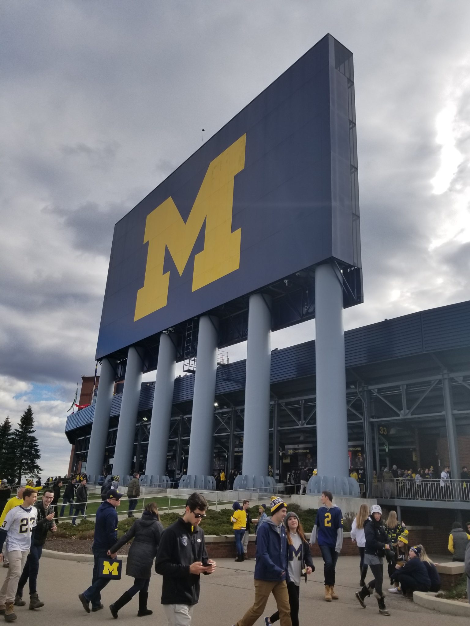 a large sign with a yellow m on it