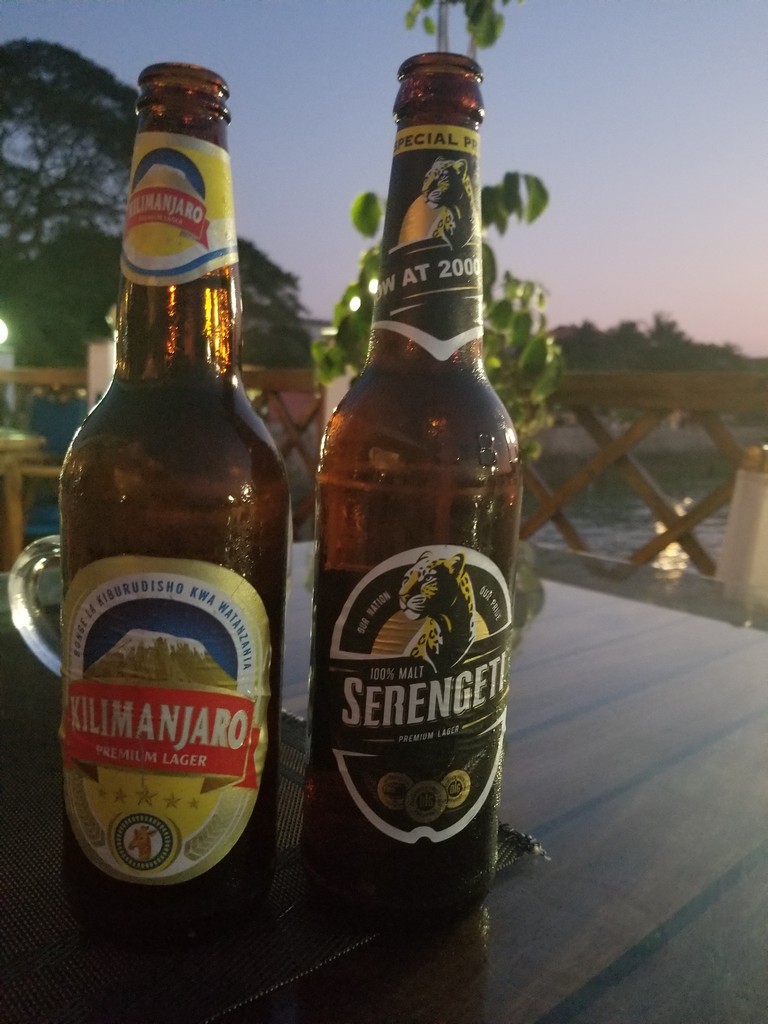 two bottles of beer on a table