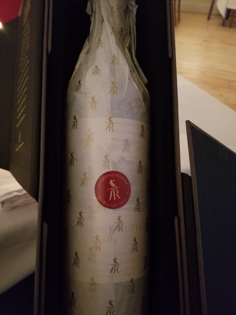 a bottle of wine in a box