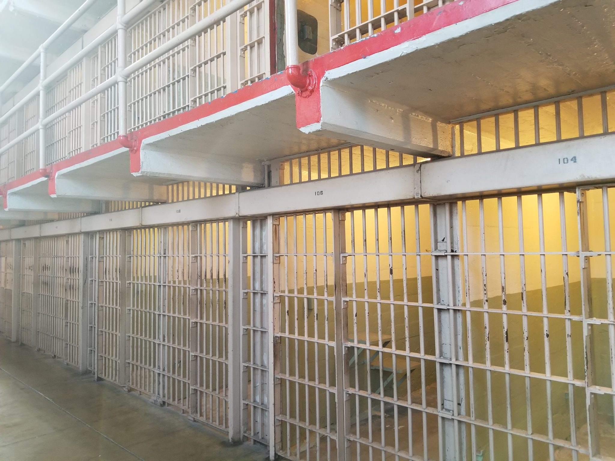 a prison cell with bars