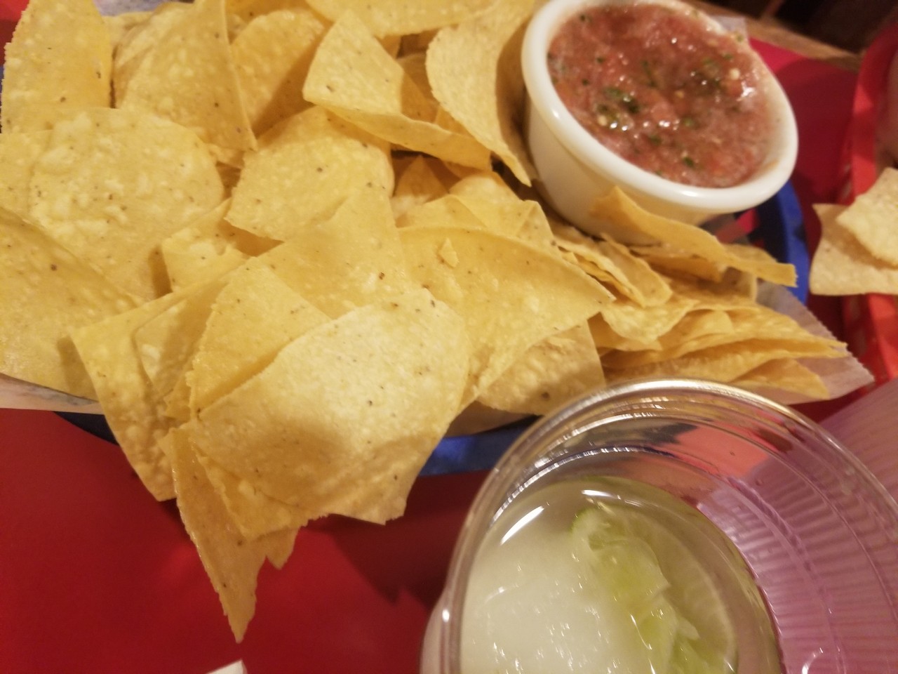 a plate of chips and salsa
