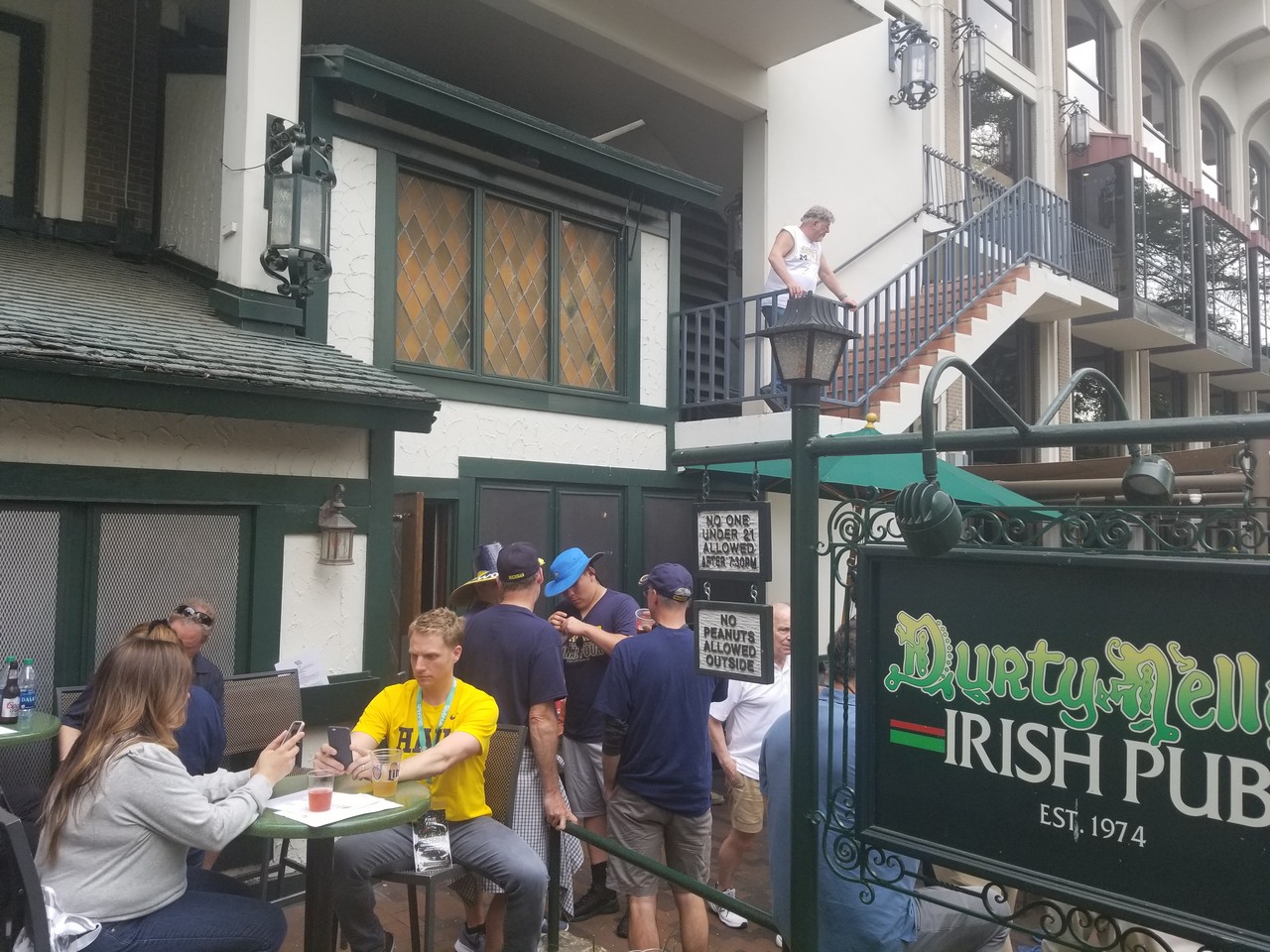 a group of people outside a restaurant