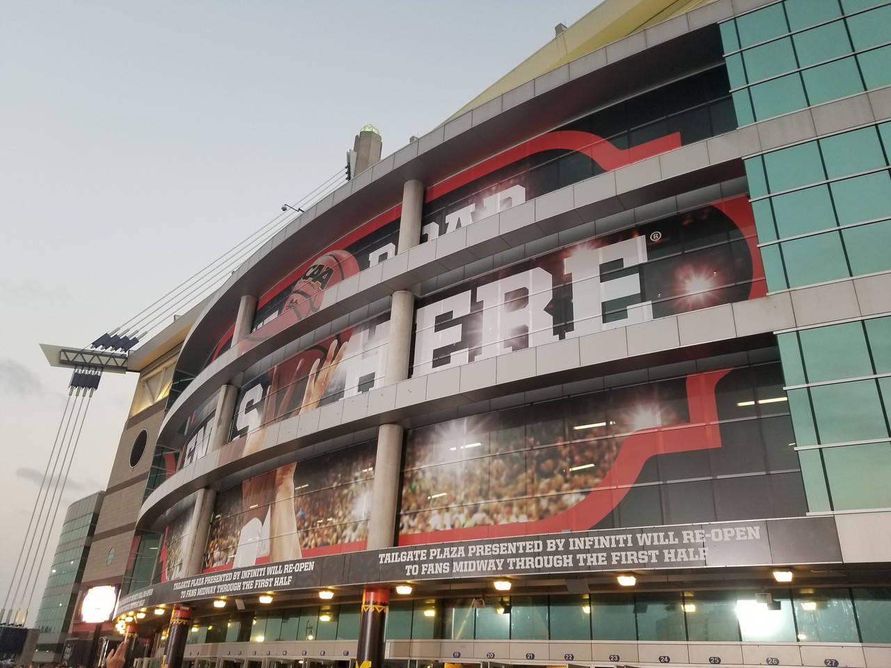 a large building with a large advertisement on the side
