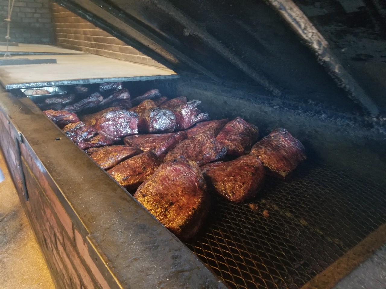 meat in a smoker