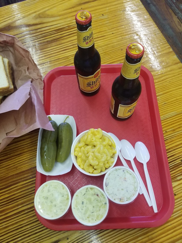 a tray of food and beer