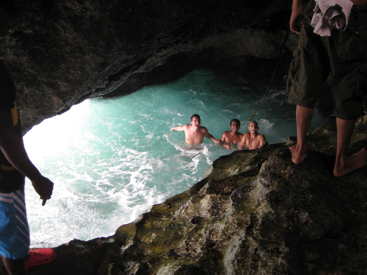 a group of people in a cave