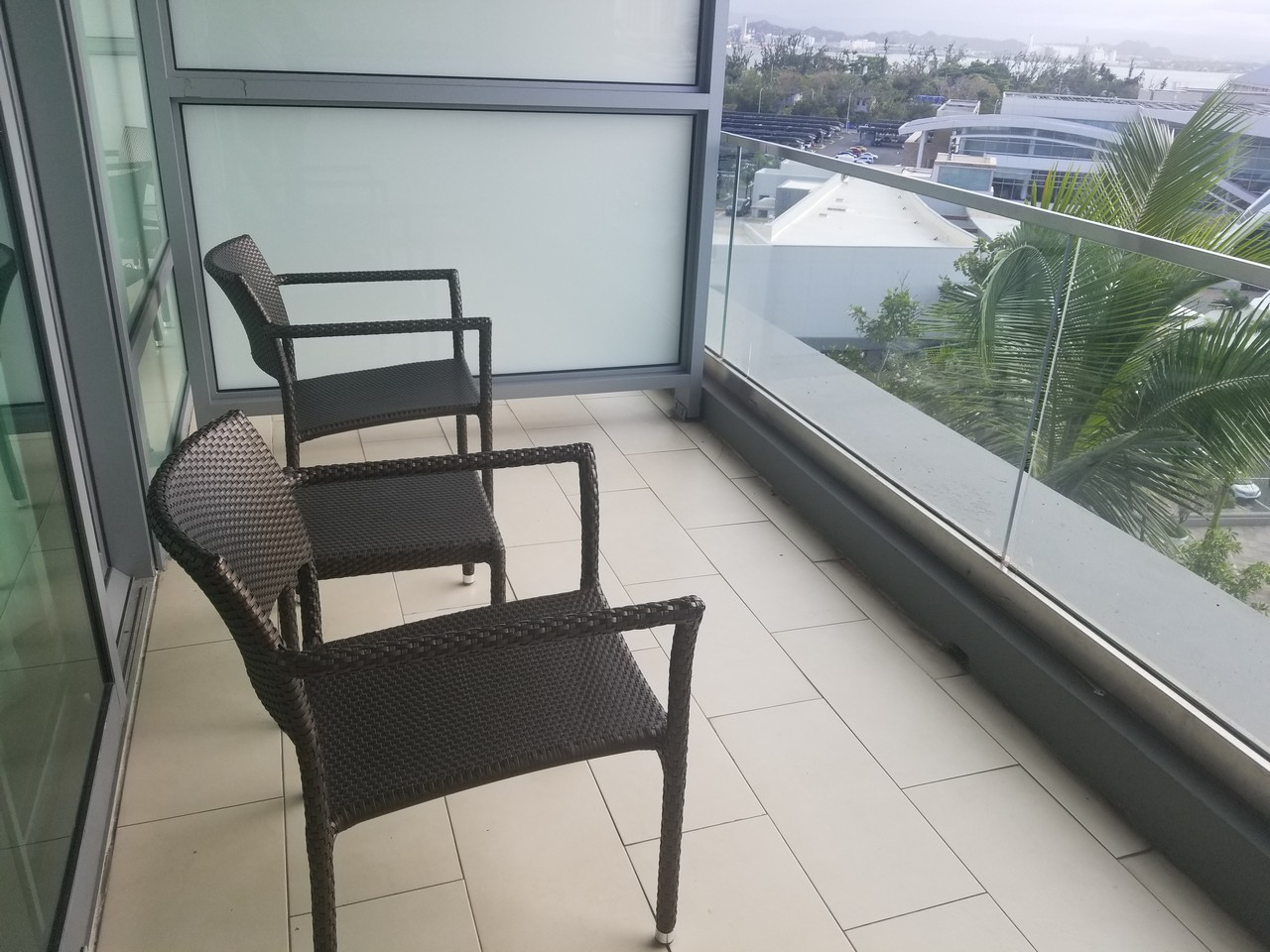 two chairs on a balcony