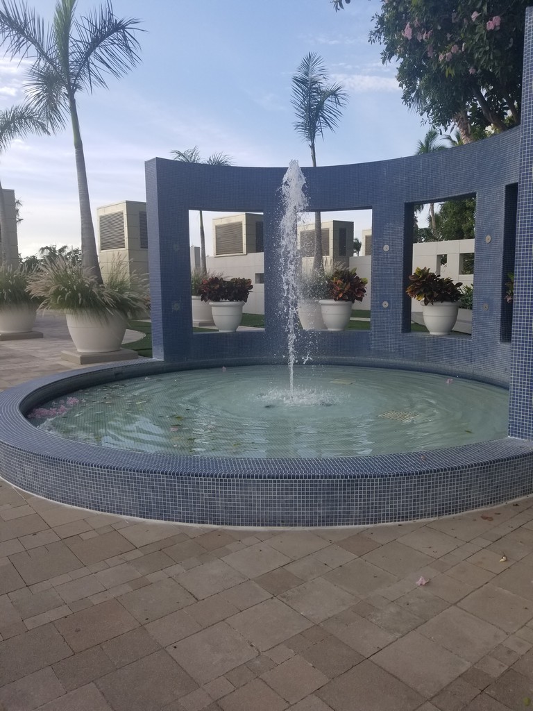 a water fountain in a courtyard