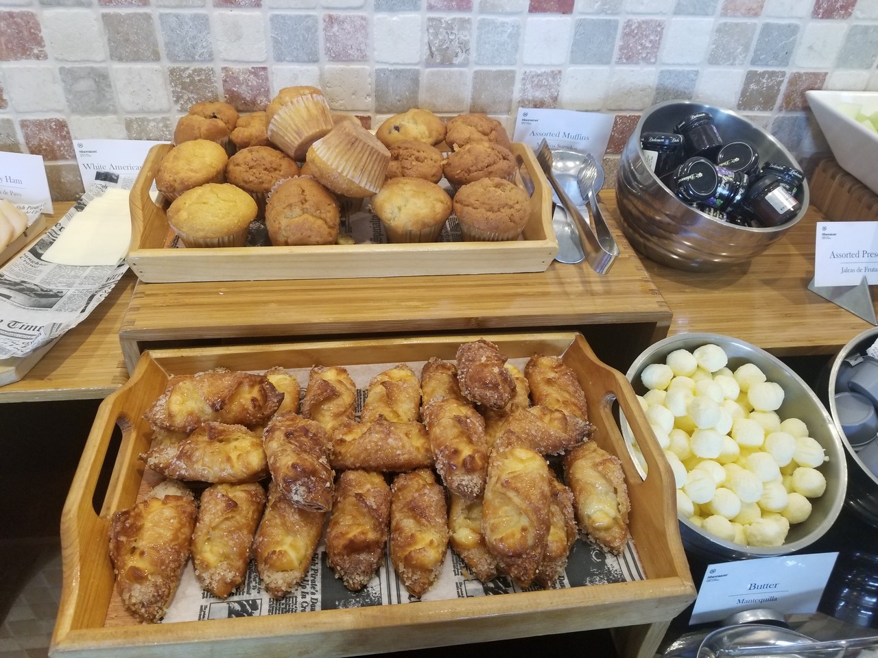a trays of pastries and muffins
