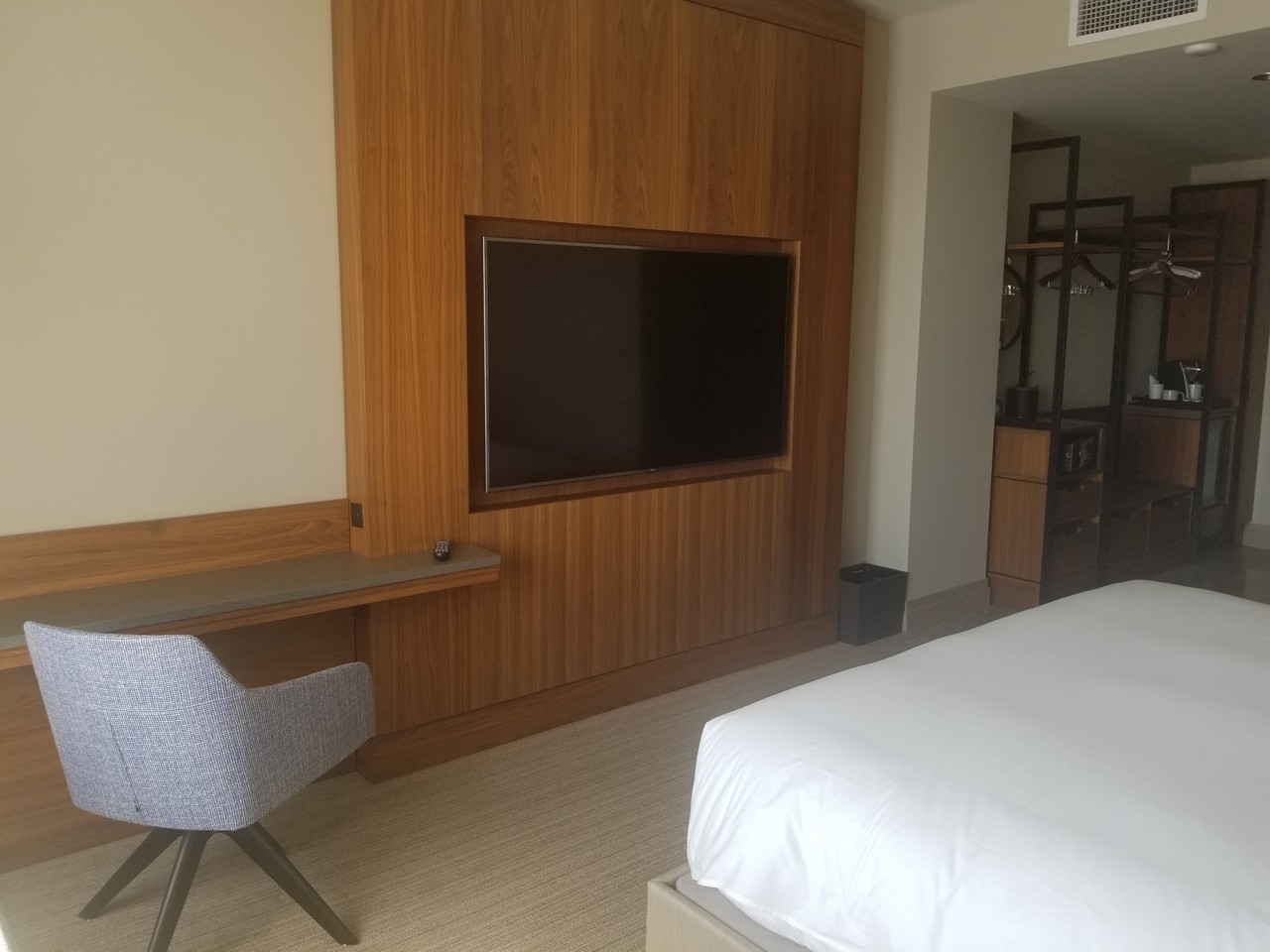 a room with a tv on the wall