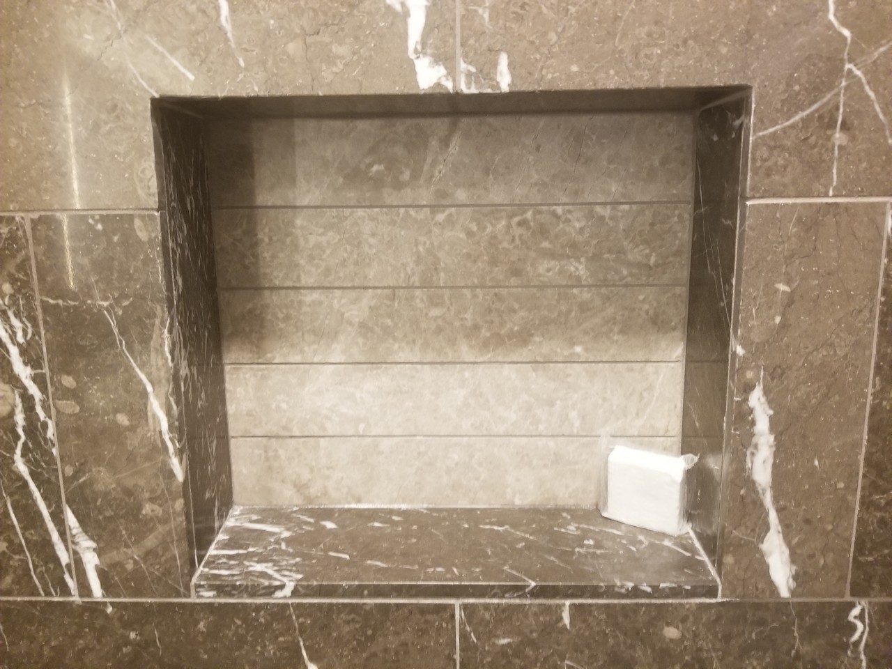 a tile niche in a bathroom