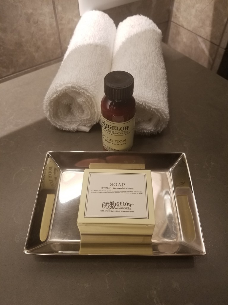 a soap and a towel on a counter