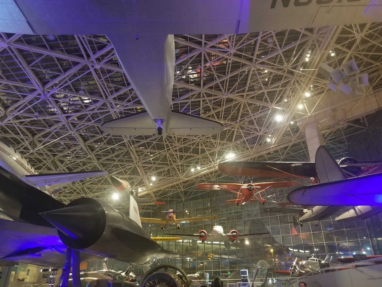 a group of airplanes from a ceiling