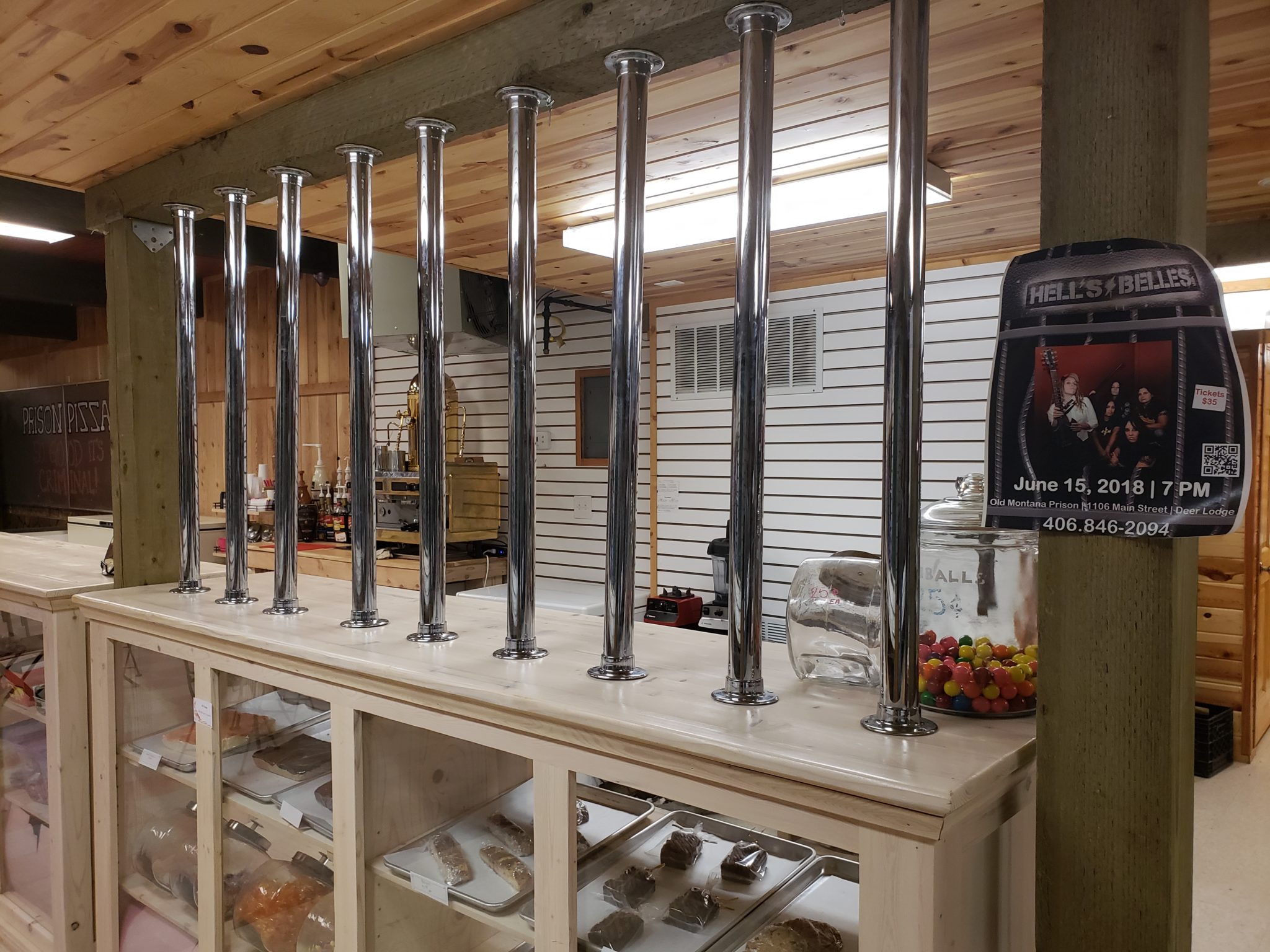 a display case with metal poles