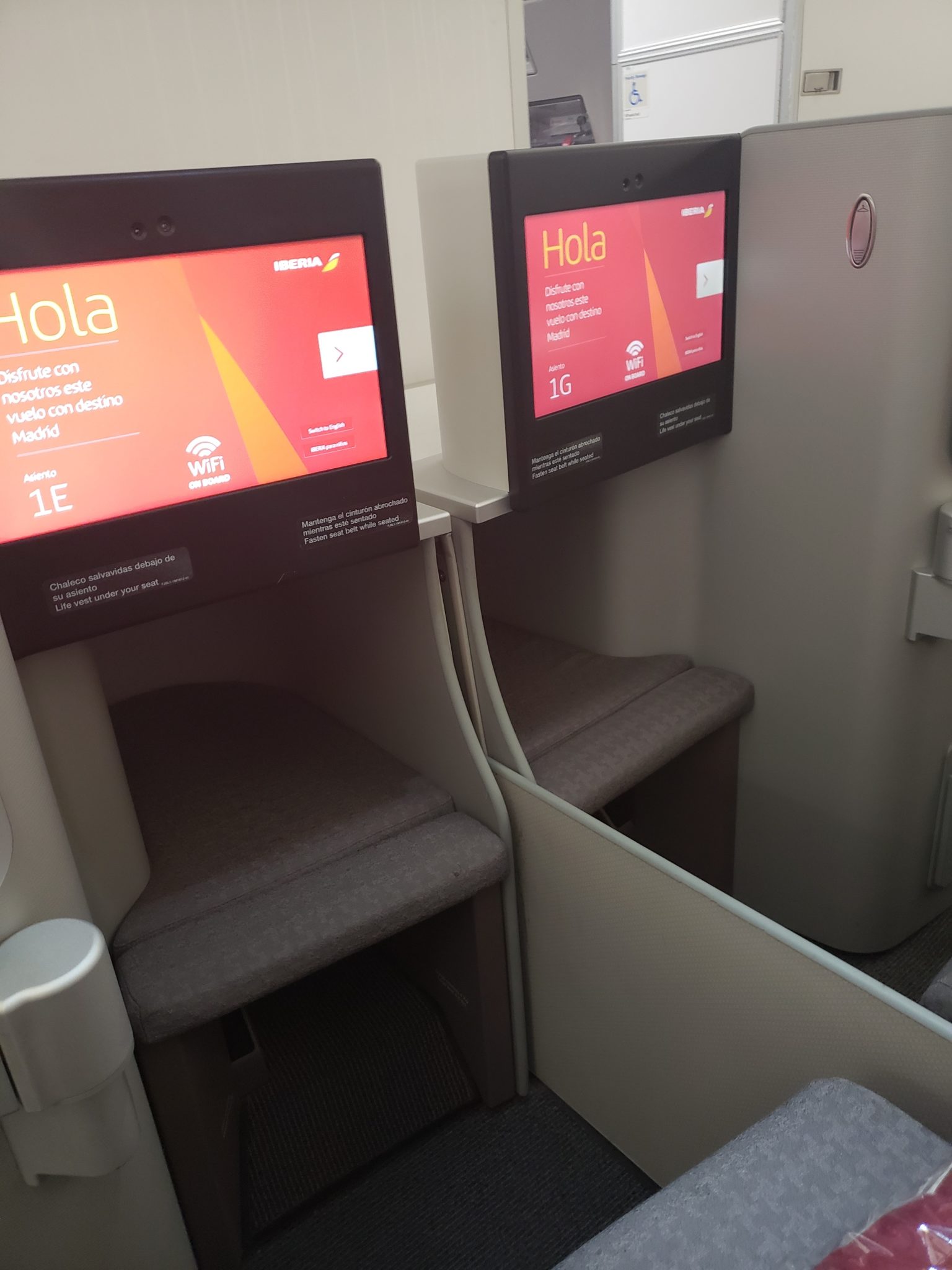a two monitors on a plane
