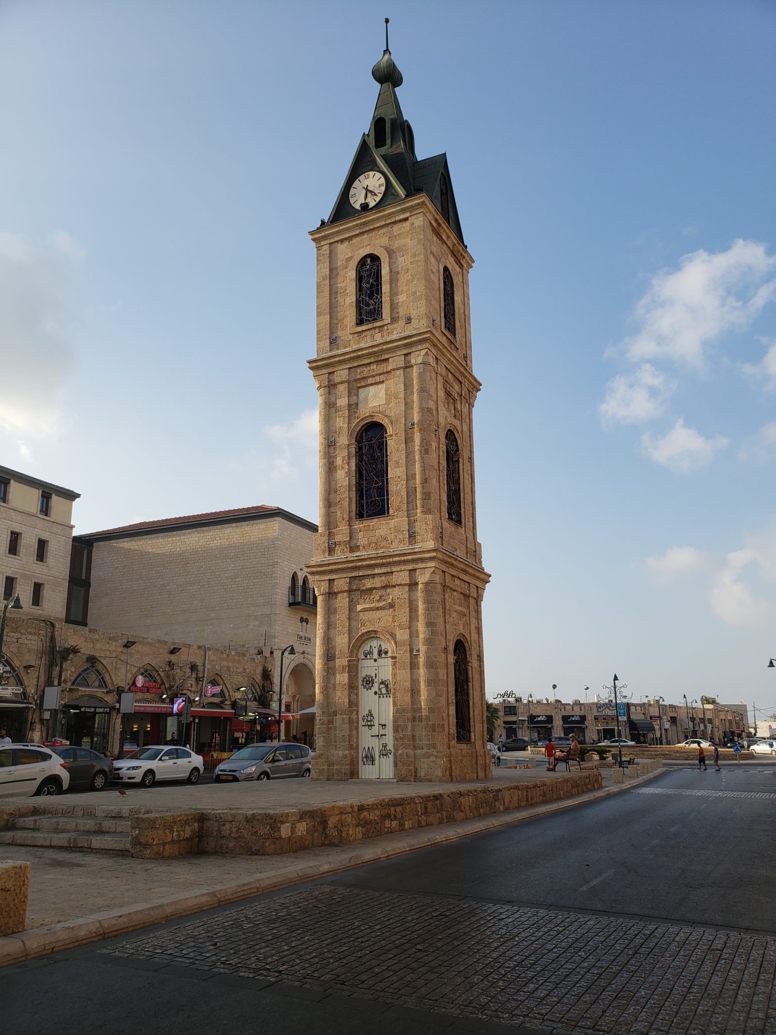 a clock tower on a street