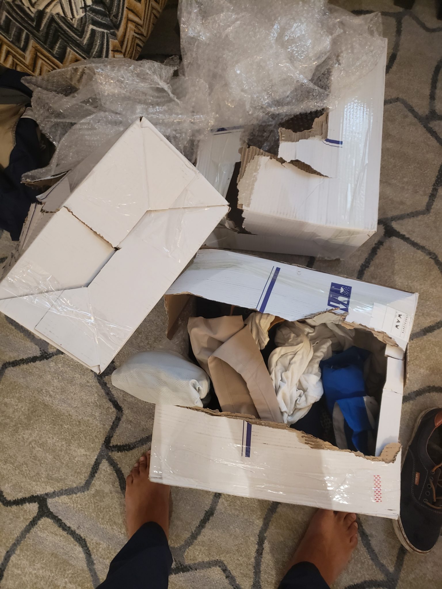 a group of boxes on a carpet
