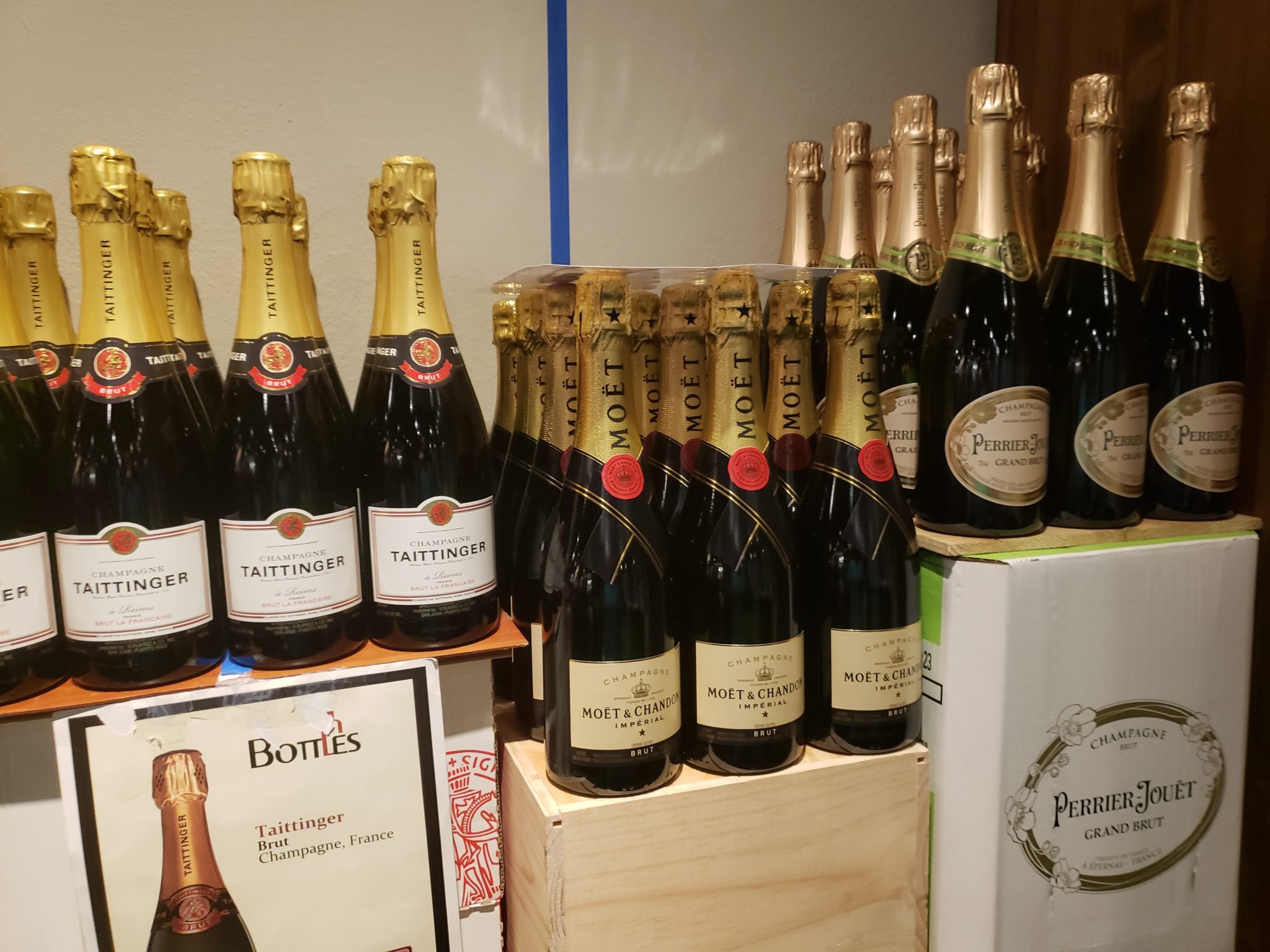 a group of bottles of champagne