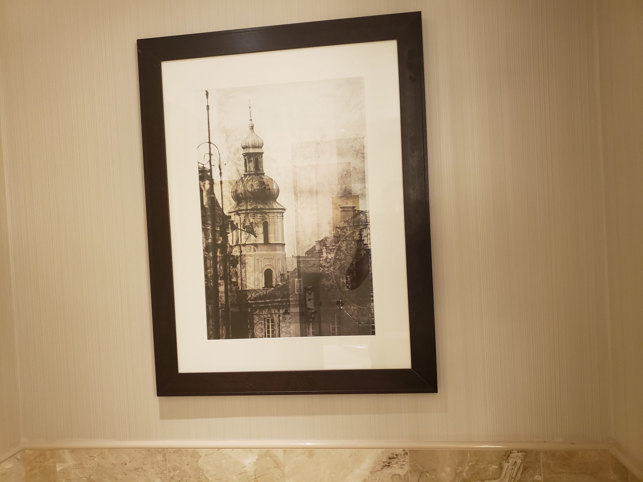 a framed picture on a wall