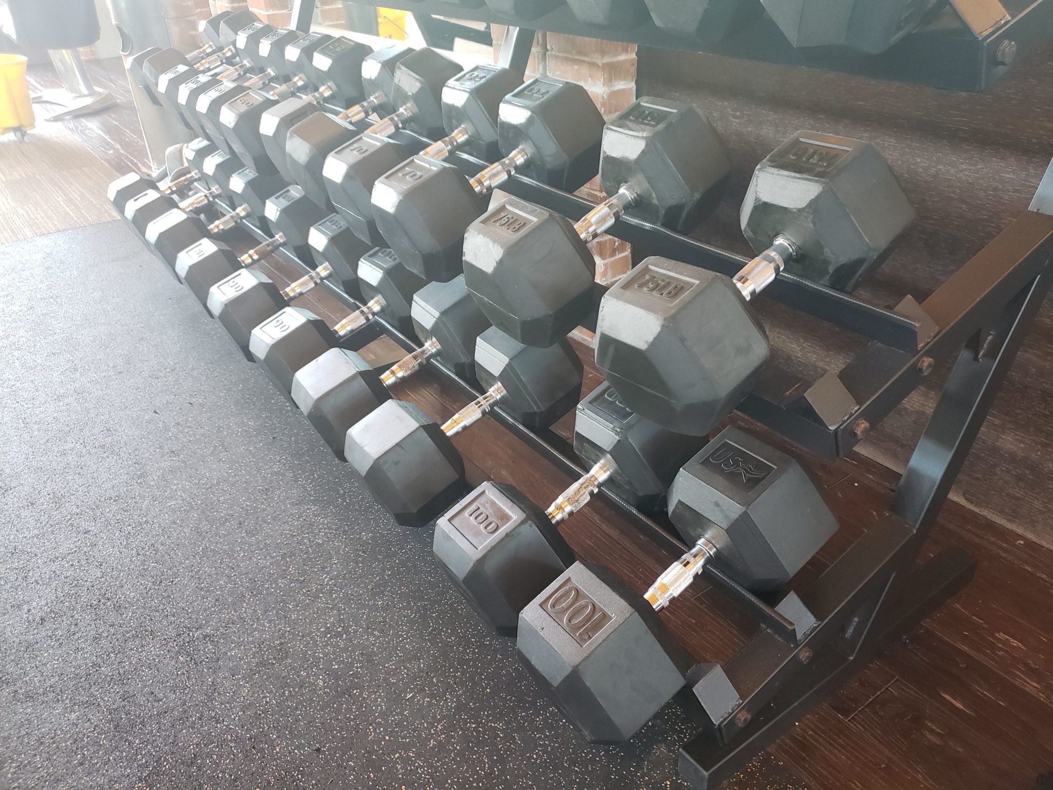 a rack of weights on a floor