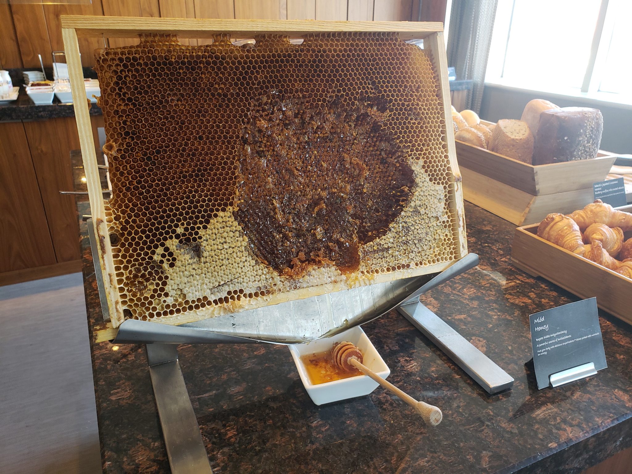 a honeycomb frame with honey in it