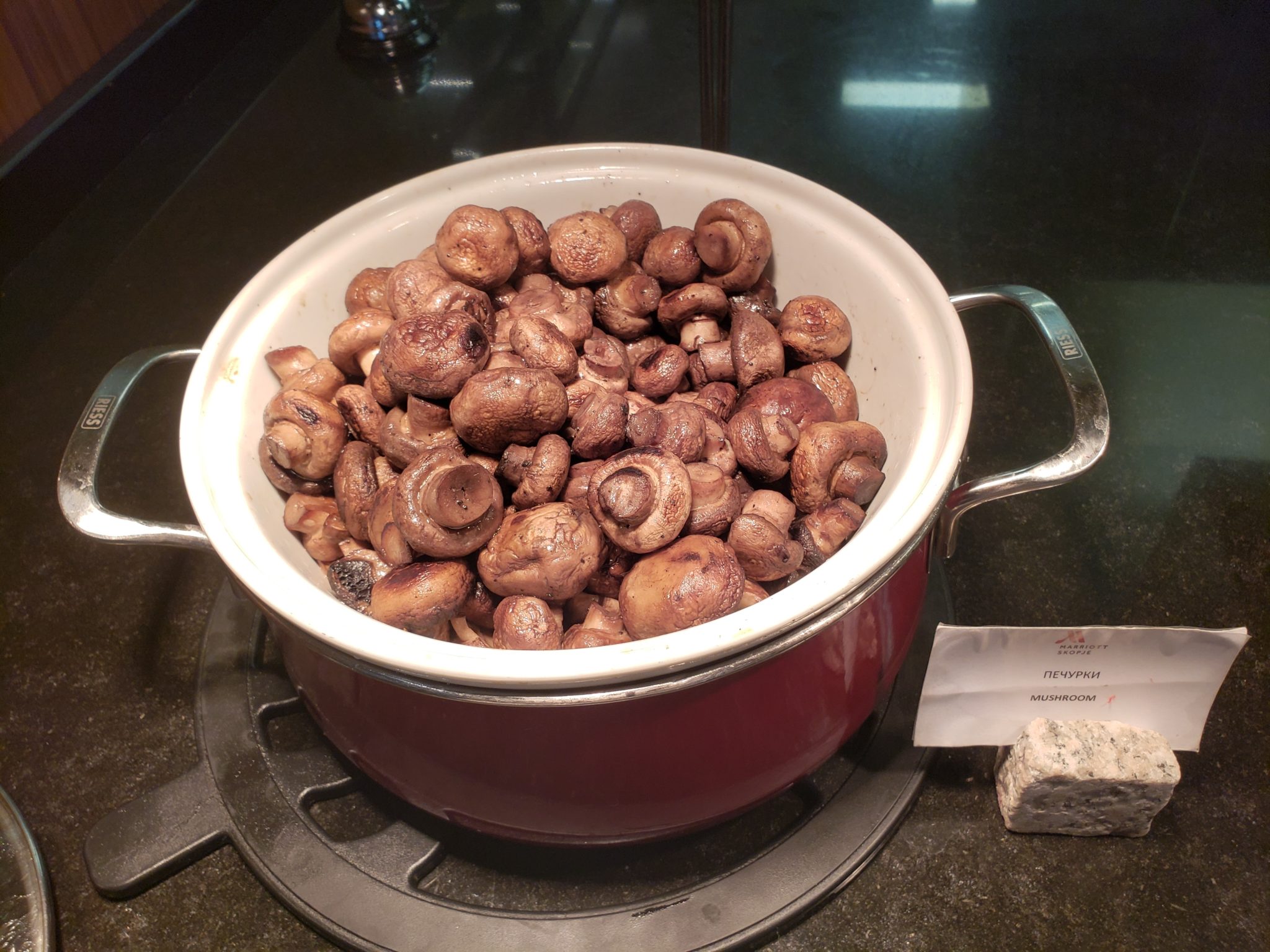a pot of mushrooms on a stove