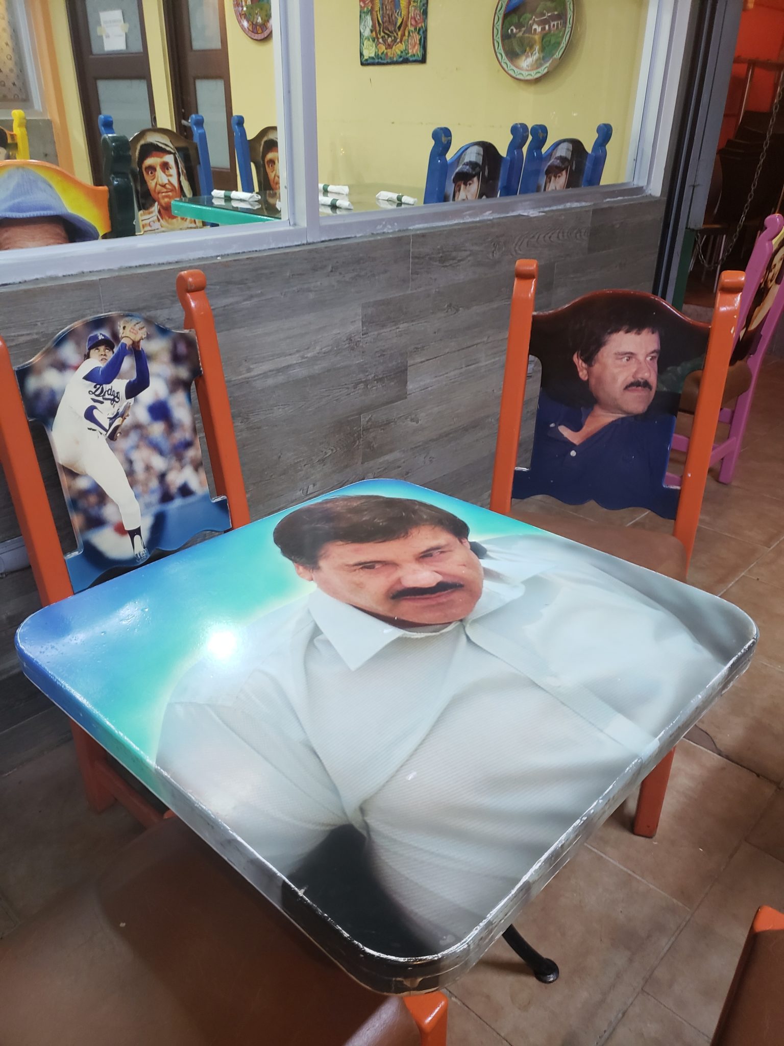 a table with a picture of a man on it