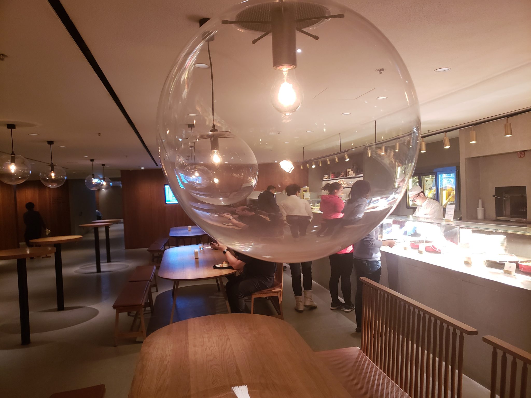 a large glass ball from a ceiling