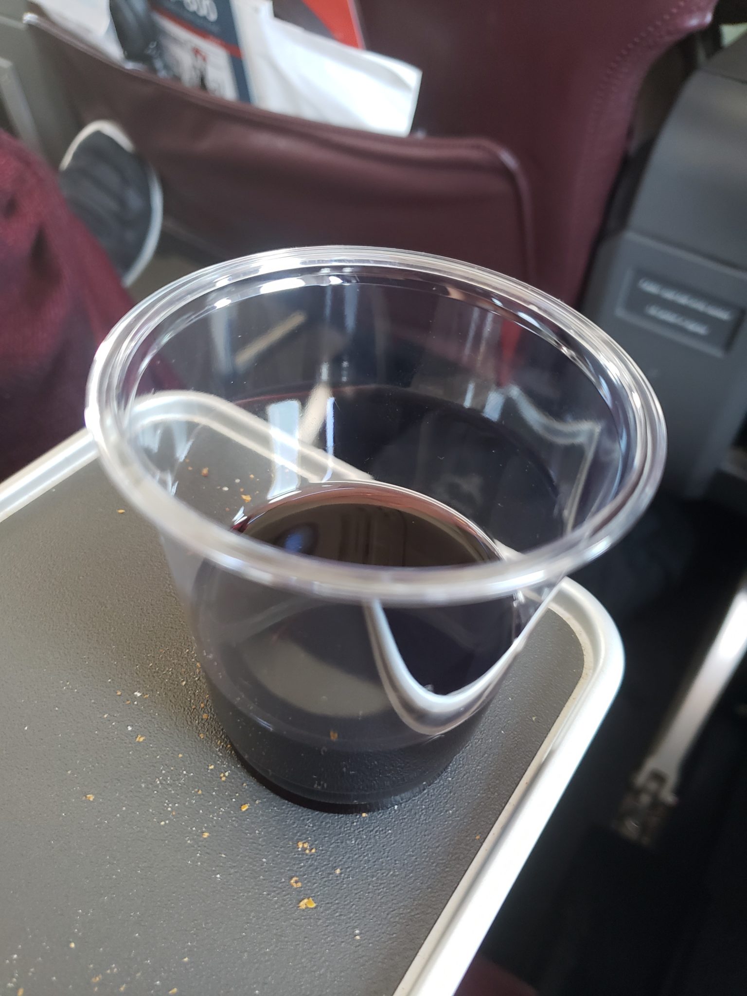 a plastic cup with a liquid in it