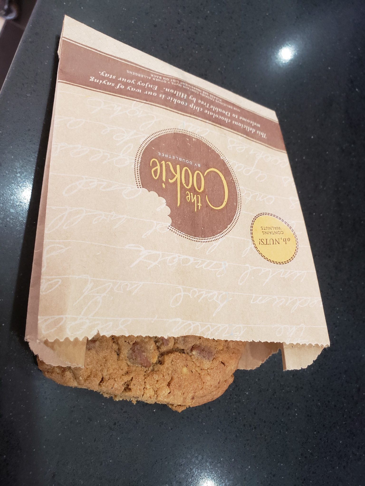 a cookie in a paper bag