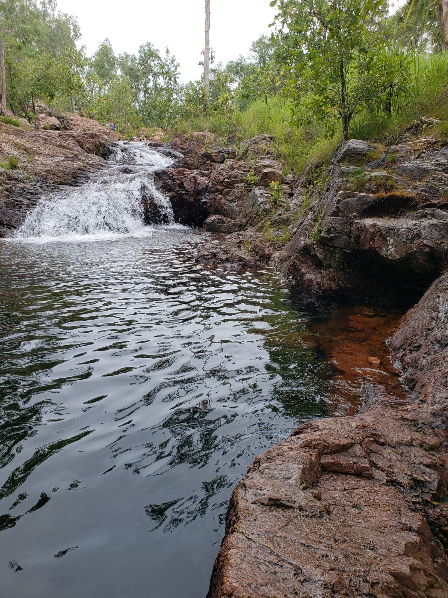 a small waterfall in a river
