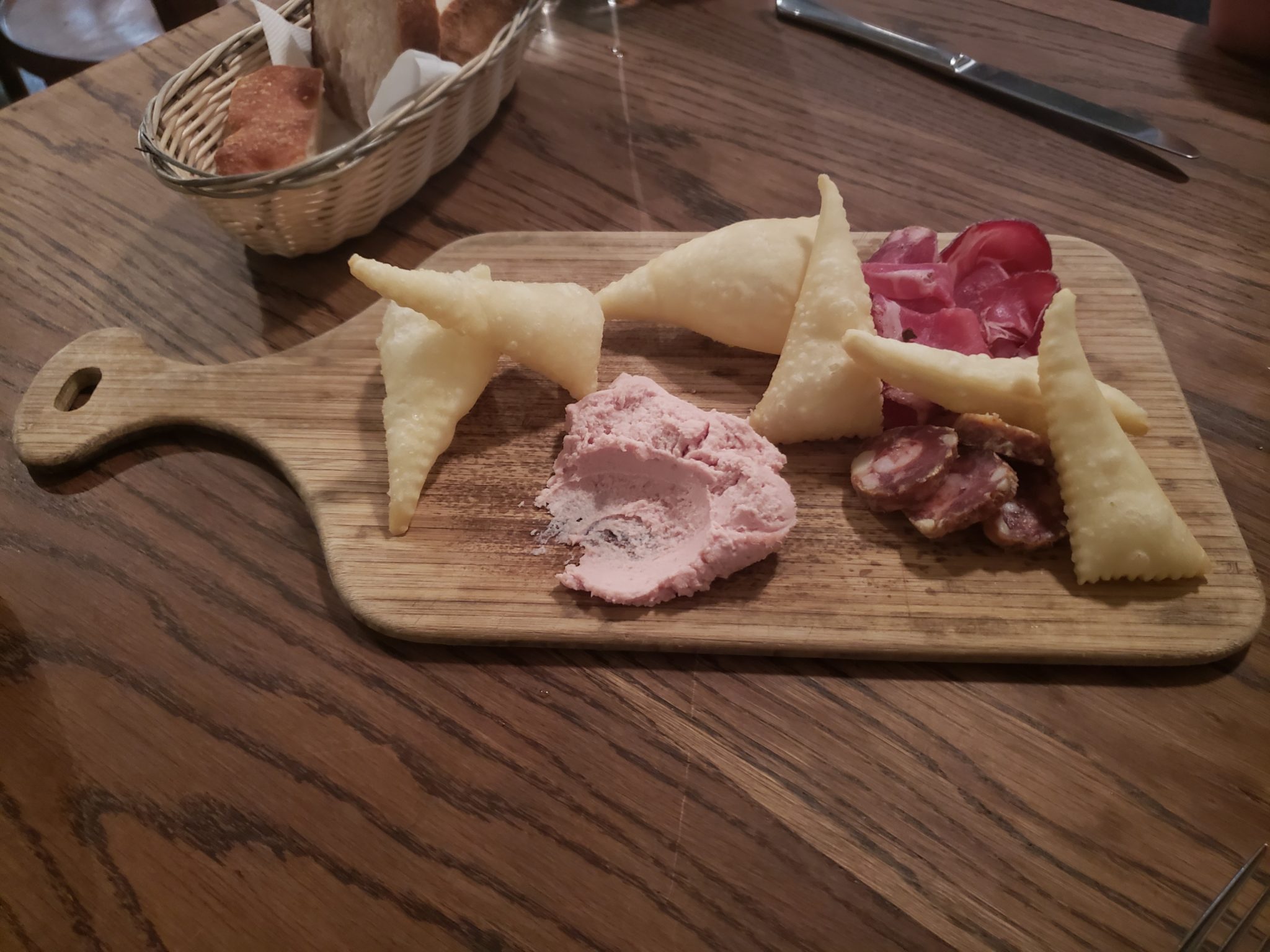 a plate of food on a wooden surface