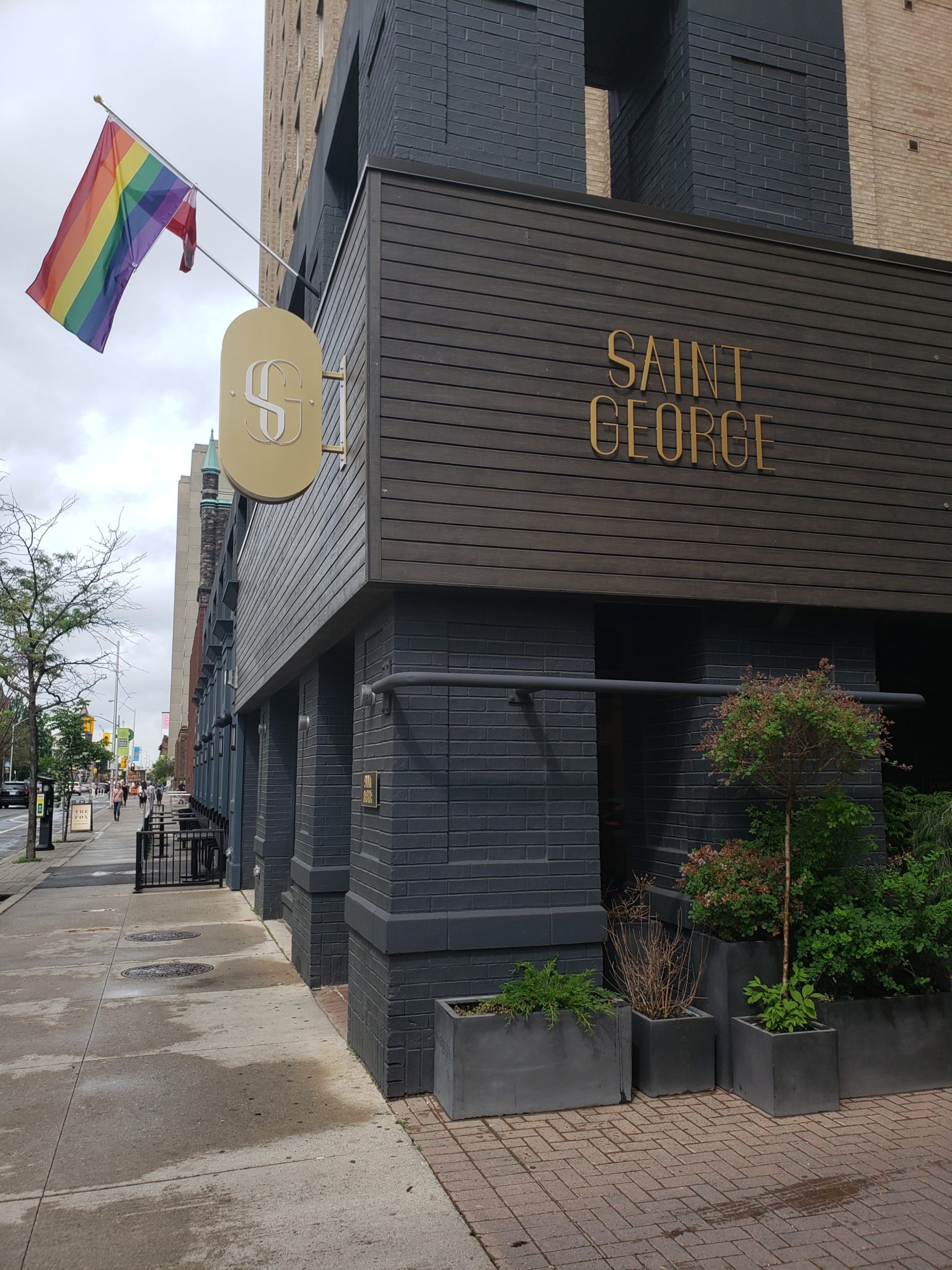 a building with a rainbow flag