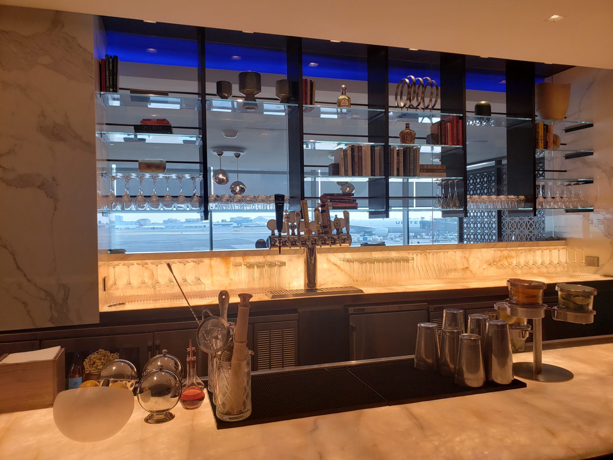 a bar with a counter and shelves
