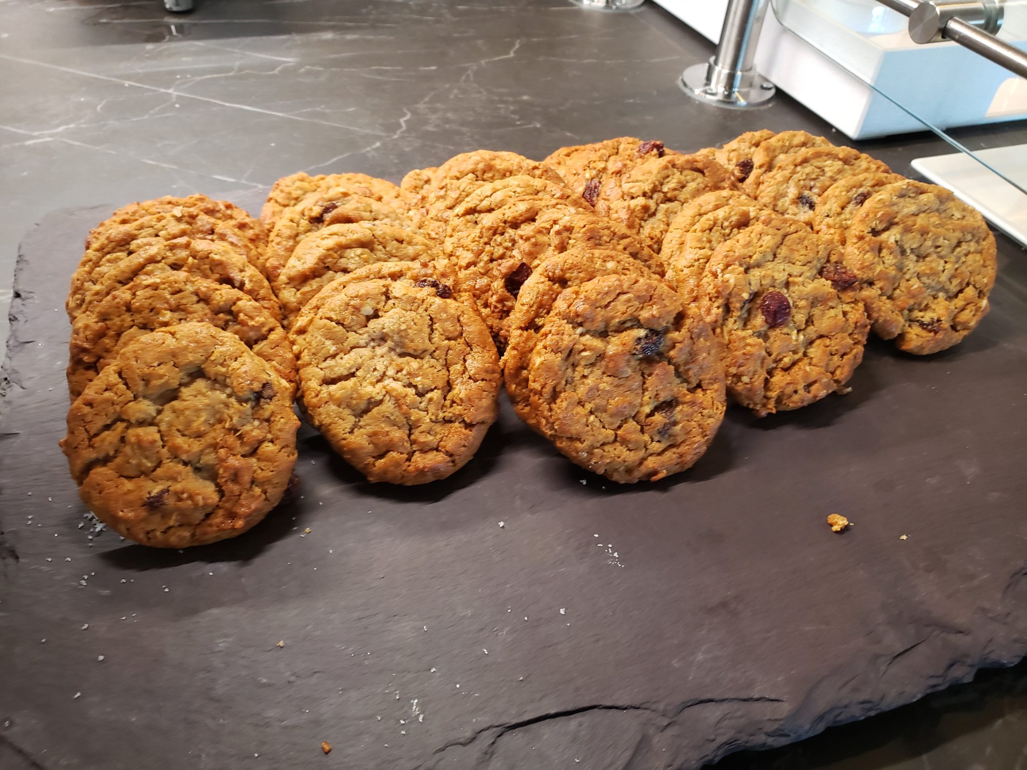 a group of cookies on a black surface