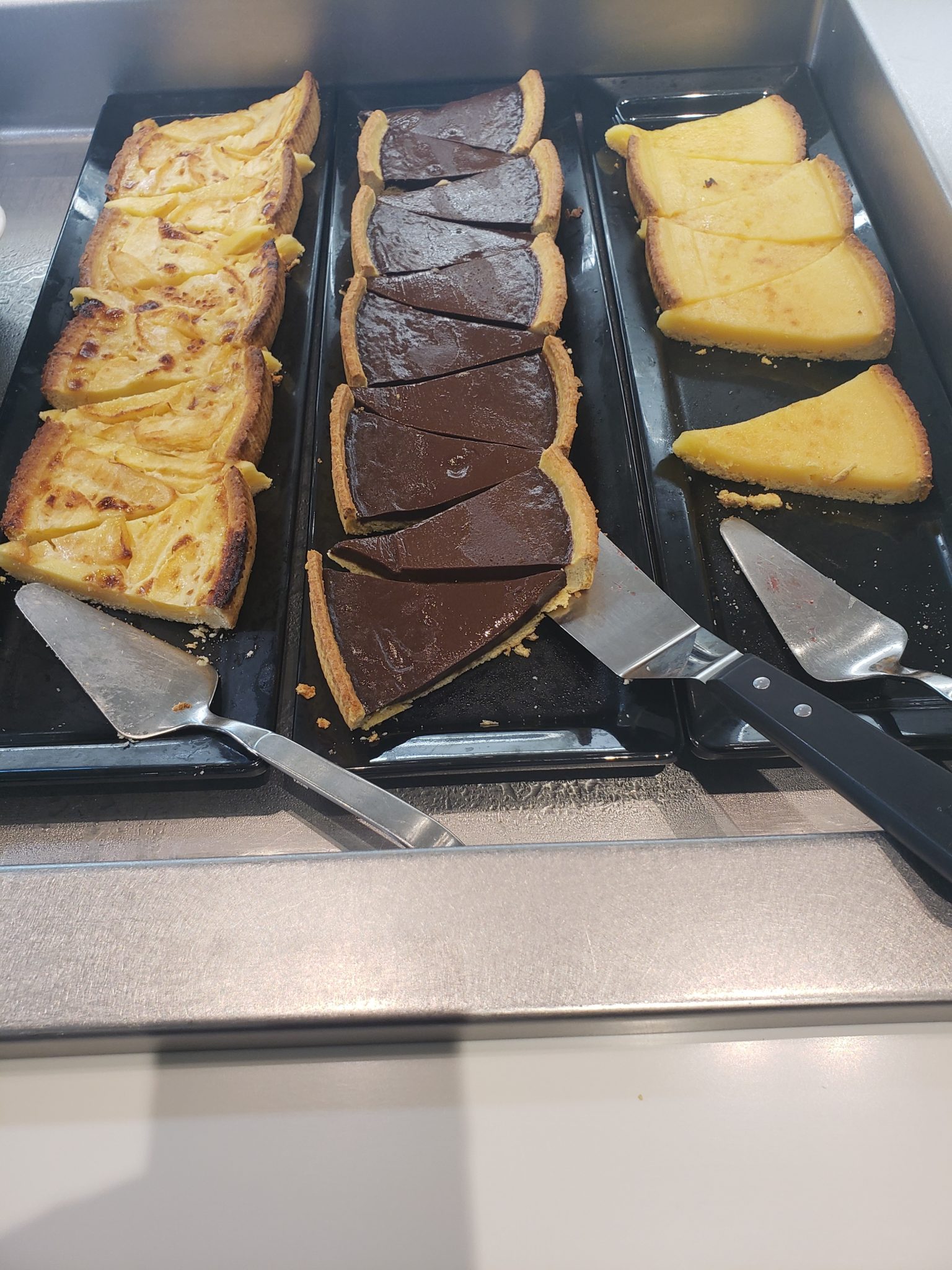 a tray of food with knifes