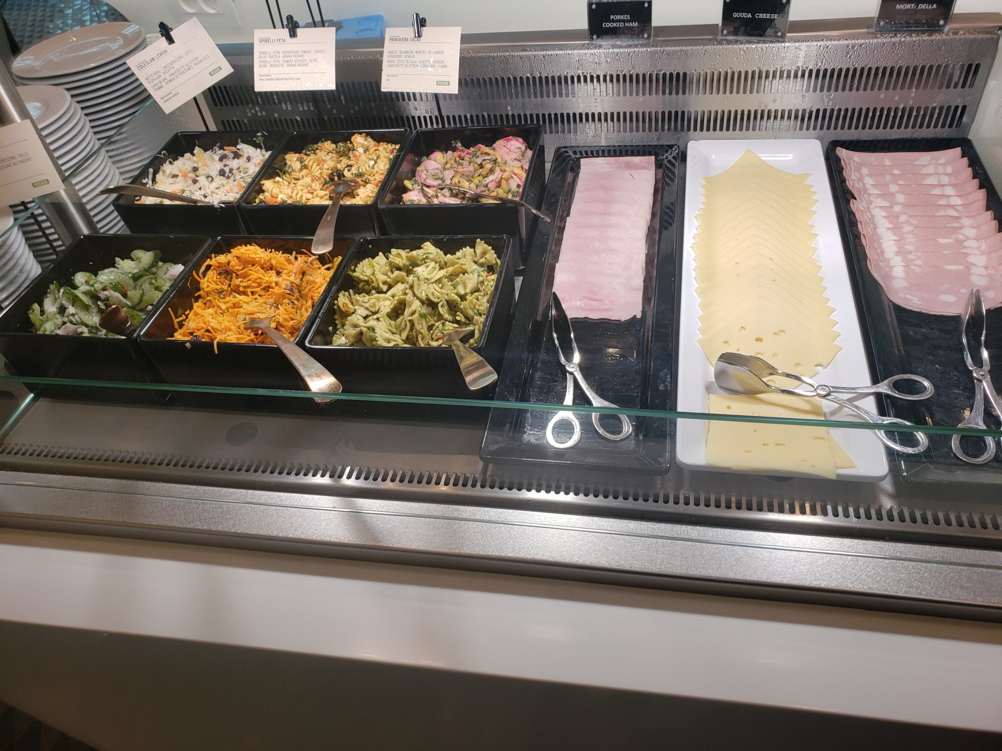 a trays of food in a display case
